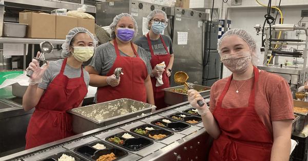 Medical imaging students Sharmaine Moore, Maria Cosentino, Christy Van Aken and Natalie Giovan volunteer at Meals on Wheels of Central Maryland. 